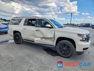 Czwarte zdjęcie samochodu z boku: 2015 CHEVROLET SUBURBAN C1500 LT VIN:1GNSCJKCXFR726988 - miniatura