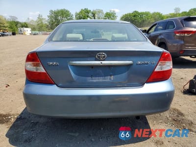 Zdjęcie 6 z 13 samochodu: 2002 TOYOTA CAMRY LE VIN:4T1BE32K02U564829 - miniatura