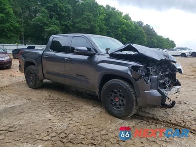 Czwarte zdjęcie samochodu z boku: 2022 TOYOTA TUNDRA SR5 VIN:5TFLA5AB3NX012584 - miniatura