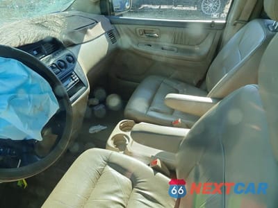 Zdjęcie 8 z 12 samochodu: 2003 HONDA ODYSSEY EXL VIN:2HKRL18923H504824 - miniatura