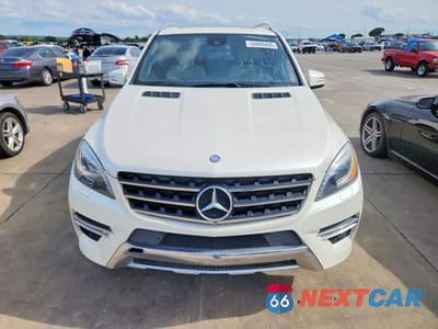 Piąte zdjęcie samochodu w środku: 2013 MERCEDES-BENZ ML 550 4MATIC VIN:4JGDA7DB4DA100925 - miniatura