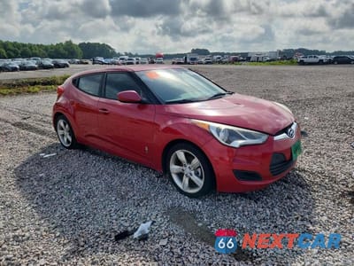 Czwarte zdjęcie samochodu z boku: 2015 HYUNDAI VELOSTER BASE VIN:KMHTC6AD7FU228874 - miniatura
