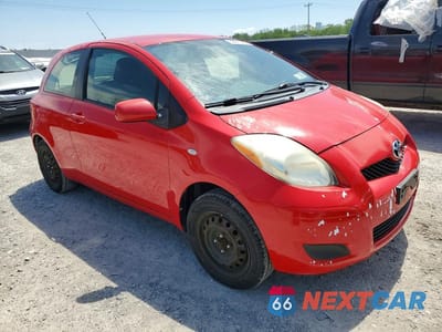 Czwarte zdjęcie samochodu z boku: 2009 TOYOTA YARIS BASE VIN:JTDJT903X95237122 - miniatura