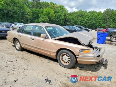 Czwarte zdjęcie samochodu z boku: 1996 FORD CROWN VICTORIA LX VIN:2FALP74W5TX124681 - miniatura