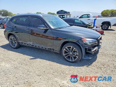 Czwarte zdjęcie samochodu z boku: 2013 BMW X1 XDRIVE28I VIN:WBAVL1C55DVR91325 - miniatura