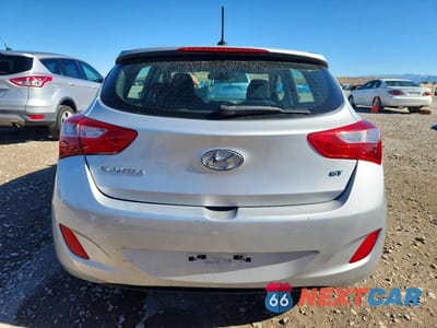 Zdjęcie 6 z 12 samochodu: 2014 HYUNDAI ELANTRA GT BASE VIN:KMHD35LH4EU215464 - miniatura