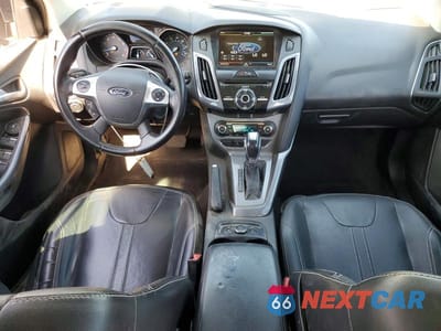 Zdjęcie 8 z 13 samochodu: 2014 FORD FOCUS TITANIUM VIN:1FADP3N21EL311957 - miniatura