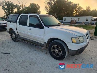 Czwarte zdjęcie samochodu z boku: 2003 FORD EXPLORER SPORT TRAC VIN:1FMZU67E23UB07141 - miniatura