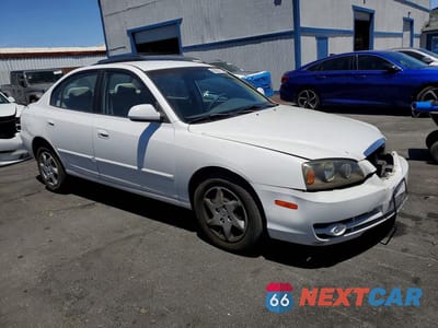 Czwarte zdjęcie samochodu z boku: 2004 HYUNDAI ELANTRA GLS VIN:KMHDN46D24U907380 - miniatura