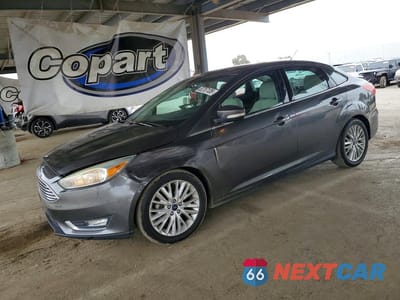 2017 FORD FOCUS TITANIUM 1FADP3J20HL288147 - główne zdjęcie licytacji z USA - miniatura