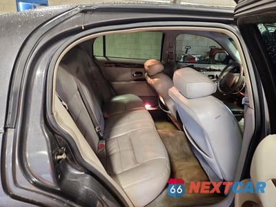 Zdjęcie 10 z 12 samochodu: 2000 LINCOLN TOWN CAR SIGNATURE VIN:1LNHM82W8YY857876 - miniatura