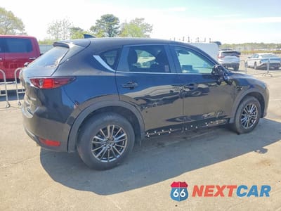 Trzecie zdjęcie samochodu z tyłu: 2021 MAZDA CX-5 TOURING VIN:JM3KFACM6M0337927 - miniatura