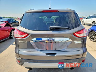 Zdjęcie 6 z 12 samochodu: 2014 FORD ESCAPE TITANIUM VIN:1FMCU0JX2EUB44576 - miniatura
