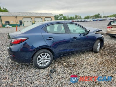 Trzecie zdjęcie samochodu z tyłu: 2017 TOYOTA YARIS IA BASE VIN:3MYDLBYVXHY163214 - miniatura