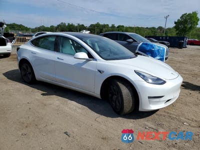 Czwarte zdjęcie samochodu z boku: 2019 TESLA MODEL 3 VIN:5YJ3E1EA1KF417816 - miniatura