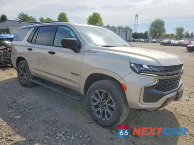 Czwarte zdjęcie samochodu z boku: 2021 CHEVROLET TAHOE K1500 Z71 VIN:1GNSKPKD3MR371268 - miniatura