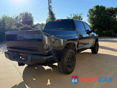 Czwarte zdjęcie samochodu z boku: 2015 TOYOTA TUNDRA SR5 VIN:5TFDW5F12FX440668 - miniatura
