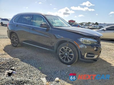 Czwarte zdjęcie samochodu z boku: 2014 BMW X5 XDRIVE35I VIN:5UXKR0C5XE0H19643 - miniatura
