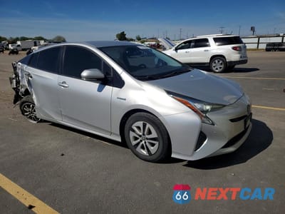 Czwarte zdjęcie samochodu z boku: 2017 TOYOTA PRIUS THREE VIN:JTDKARFU4H3049569 - miniatura