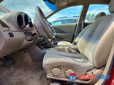 Zdjęcie 7 z 12 samochodu: 2003 NISSAN ALTIMA 2.5 VIN:1N4AL11D33C349374 - miniatura