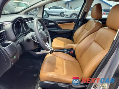 Zdjęcie 7 z 13 samochodu: 2017 HONDA FIT EX VIN:3HGGK5H78HM711978 - miniatura