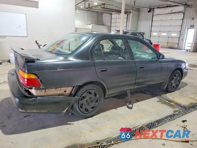 Trzecie zdjęcie samochodu z tyłu: 1993 TOYOTA COROLLA BASE VIN:2T1AE04E6PC014688 - miniatura