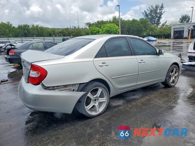 Trzecie zdjęcie samochodu z tyłu: 2002 TOYOTA CAMRY LE VIN:4T1BE32K92U099404 - miniatura