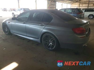 Drugie zdjęcie samochodu z przodu: 2013 BMW M5 VIN:WBSFV9C55DD096707 - miniatura