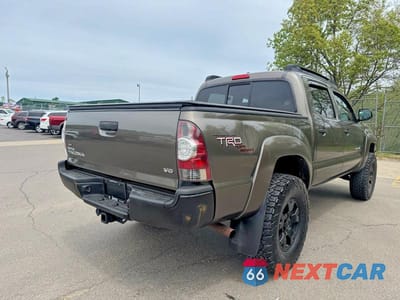 Czwarte zdjęcie samochodu z boku: 2011 TOYOTA TACOMA DOUBLE CAB VIN:3TMLU4EN8BM060850 - miniatura