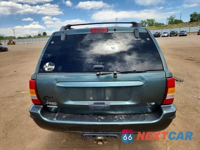 Zdjęcie 6 z 12 samochodu: 2002 JEEP GRAND CHEROKEE VIN:1J8GW68J12C206709 - miniatura