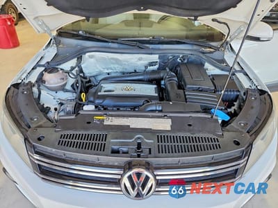 Zdjęcie 12 z 13 samochodu: 2014 VOLKSWAGEN TIGUAN S VIN:WVGBV3AXXEW542858 - miniatura