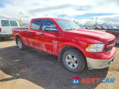 Czwarte zdjęcie samochodu z boku: 2015 RAM 1500 SLT VIN:1C6RR7TM6FS558945 - miniatura
