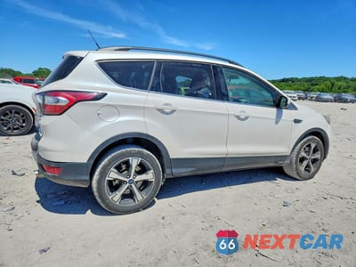 Trzecie zdjęcie samochodu z tyłu: 2018 FORD ESCAPE SEL VIN:1FMCU9HD9JUD16001 - miniatura