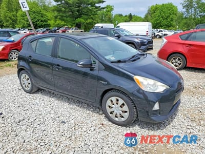 Czwarte zdjęcie samochodu z boku: 2012 TOYOTA PRIUS C TWO VIN:JTDKDTB35C1010740 - miniatura
