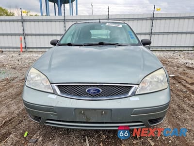 Piąte zdjęcie samochodu w środku: 2005 FORD FOCUS VIN:3FAFP37N85R118173 - miniatura