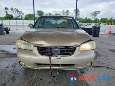 Piąte zdjęcie samochodu w środku: 2001 NISSAN MAXIMA GXE VIN:JN1CA31DX1T616143 - miniatura