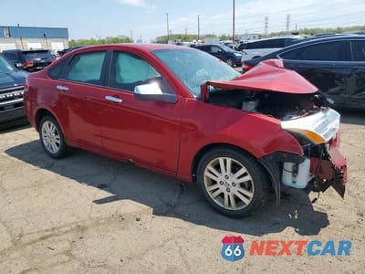 Czwarte zdjęcie samochodu z boku: 2010 FORD FOCUS SEL VIN:1FAHP3HN9AW122750 - miniatura