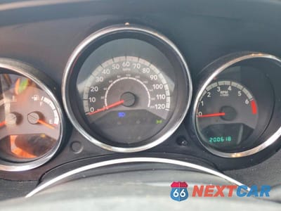 Zdjęcie 9 z 12 samochodu: 2010 DODGE CALIBER MAINSTREET VIN:1B3CB3HA7AD598167 - miniatura
