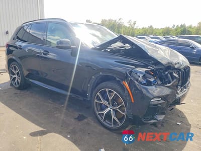 Czwarte zdjęcie samochodu z boku: 2021 BMW X5 XDRIVE45E VIN:5UXTA6C03M9H20159 - miniatura