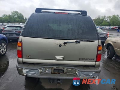 Zdjęcie 6 z 13 samochodu: 2002 CHEVROLET TAHOE K1500 VIN:1GNEK13Z42R324154 - miniatura