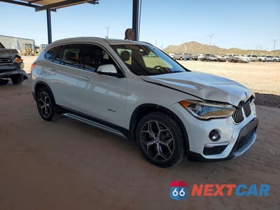 Czwarte zdjęcie samochodu z boku: 2017 BMW X1 XDRIVE28I VIN:WBXHT3C35H5F83820 - miniatura