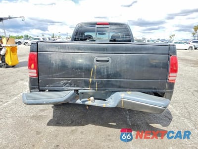 Zdjęcie 6 z 12 samochodu: 2002 DODGE DAKOTA BASE VIN:1B7GL12X32S710832 - miniatura