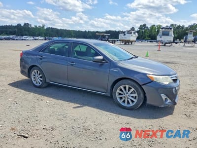 Czwarte zdjęcie samochodu z boku: 2012 TOYOTA CAMRY HYBRID XLE VIN:4T1BD1FK9CU060301 - miniatura