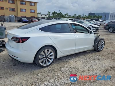Trzecie zdjęcie samochodu z tyłu: 2018 TESLA MODEL 3 VIN:5YJ3E1EA4JF154686 - miniatura