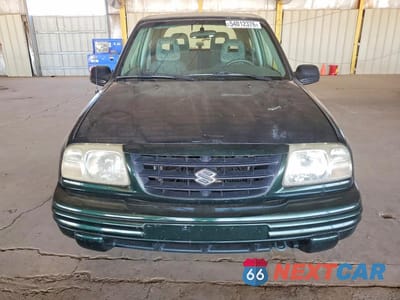 Piąte zdjęcie samochodu w środku: 2002 SUZUKI VITARA JLS VIN:2S3TC52C426100073 - miniatura