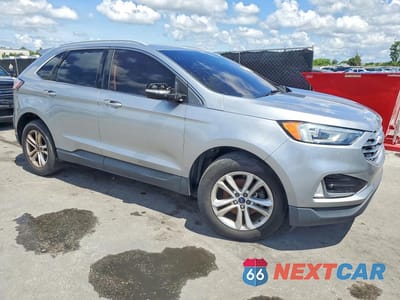 Czwarte zdjęcie samochodu z boku: 2020 FORD EDGE SEL VIN:2FMPK3J90LBA30752 - miniatura