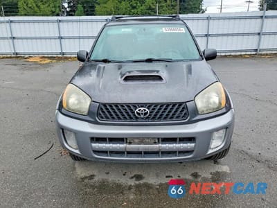 Piąte zdjęcie samochodu w środku: 2003 TOYOTA RAV4 BASE VIN:JTEGH20V930106235 - miniatura