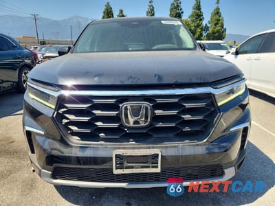 Piąte zdjęcie samochodu w środku: 2023 HONDA PILOT EXL VIN:5FNYG2H47PB006004 - miniatura