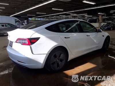 Trzecie zdjęcie samochodu z tyłu: 2022 TESLA MODEL 3 VIN:5YJ3E1EA9NF372564 - miniatura