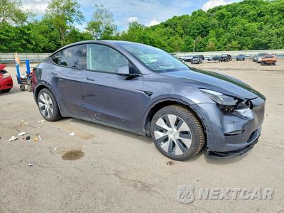 Czwarte zdjęcie samochodu z boku: 2023 TESLA MODEL Y VIN:7SAYGAEE3PF878495 - miniatura